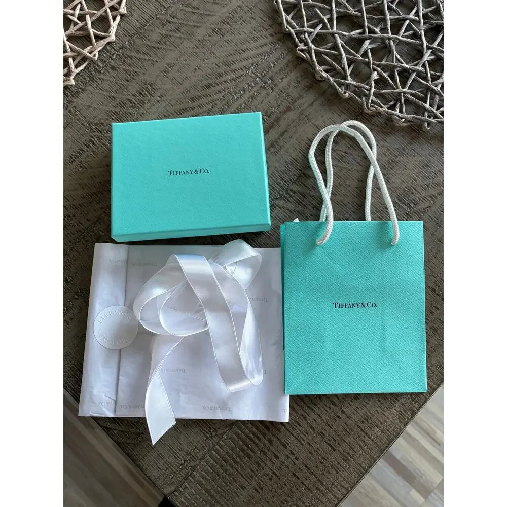 Tiffany & Co. blue giftbox, giftbag, Tiffany tissue and ribbon
